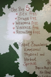 In an effort to reframe messages more positively, SDYS Storefront Shelter staff and youth whited out the “No” in front of sex, drugs, weapons, violence, or recruiting, and replaced it with “sex, drugs, weapons, violence, and recruiting free.” 